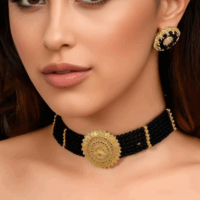 Black Beaded Necklace with Ornate Gold Floral Medallion